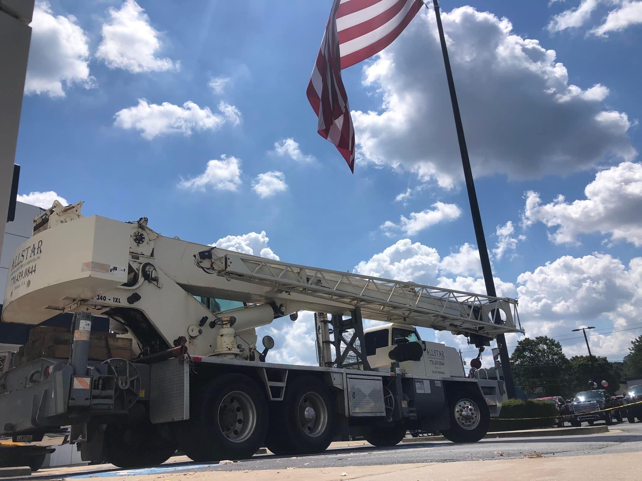 Allstar Lighting crane truck with American flag